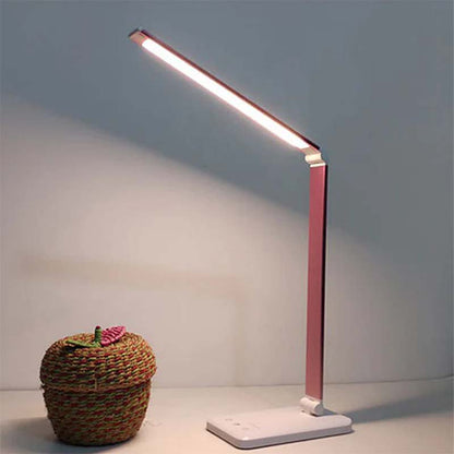 Modern LED desk lamp on a neutral background