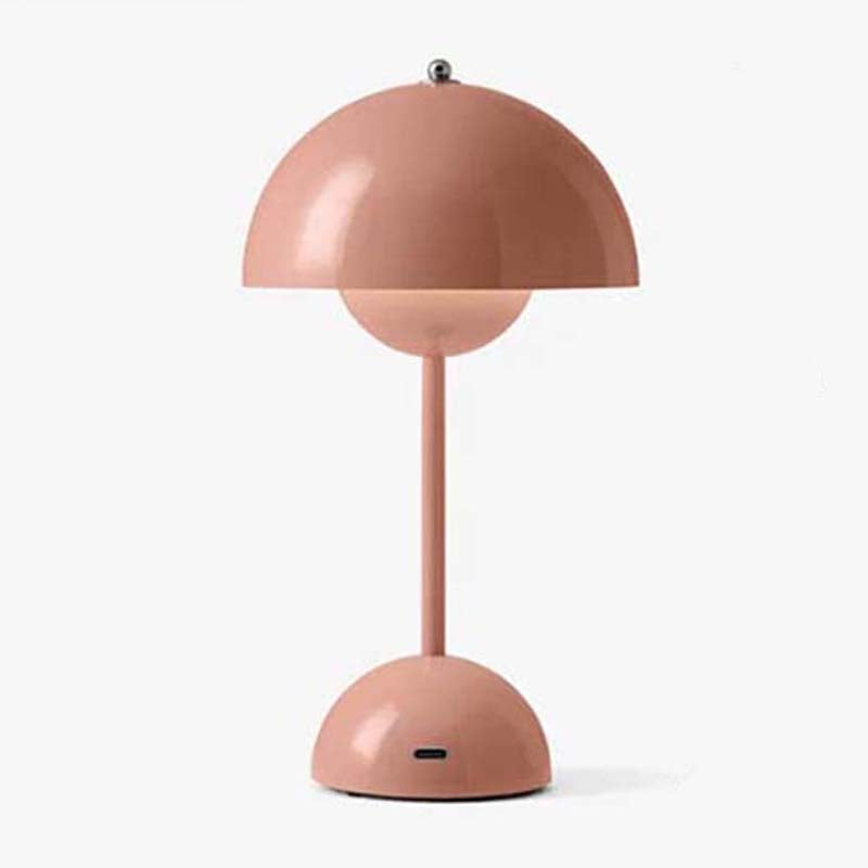 Pink table lamp on a white background