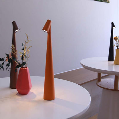 Modern lamps on a white round table with a neutral background
