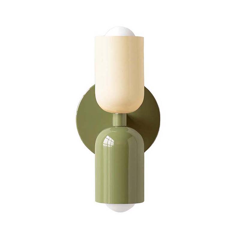Wall sconce with green base and beige shade on a white background