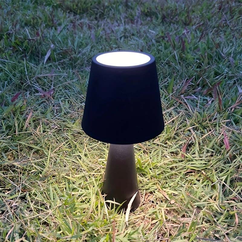 Black Retro Portable LED Bedside Lamp on the Grass