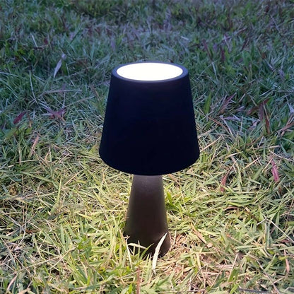 Black Retro Portable LED Bedside Lamp on the Grass