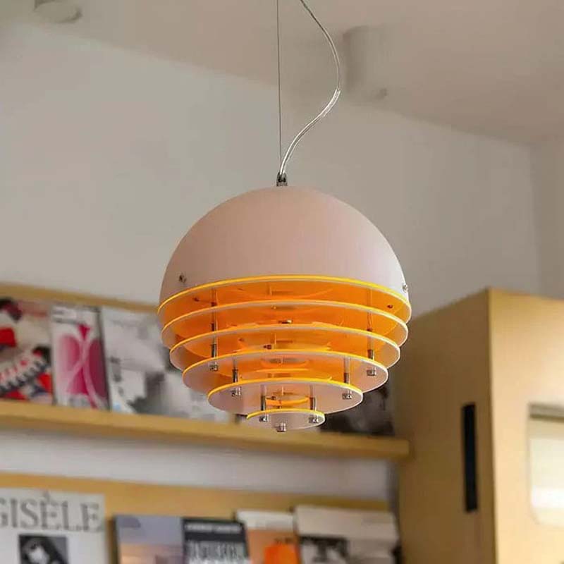 Sunset pendant light with warm orange glow indoors