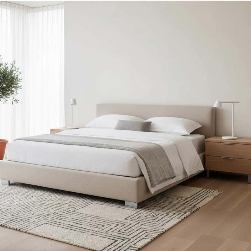 Modern bedroom with bed and bedside lamps on nightstands