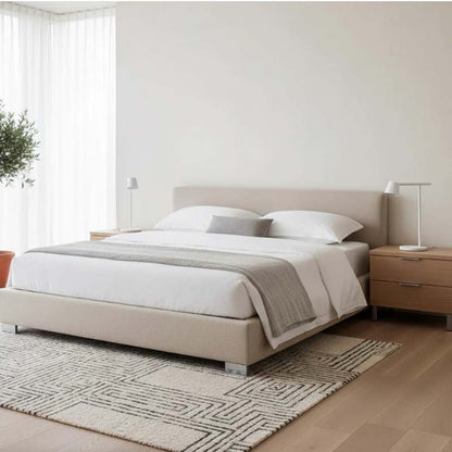Modern bedroom with bed and bedside lamps on nightstands