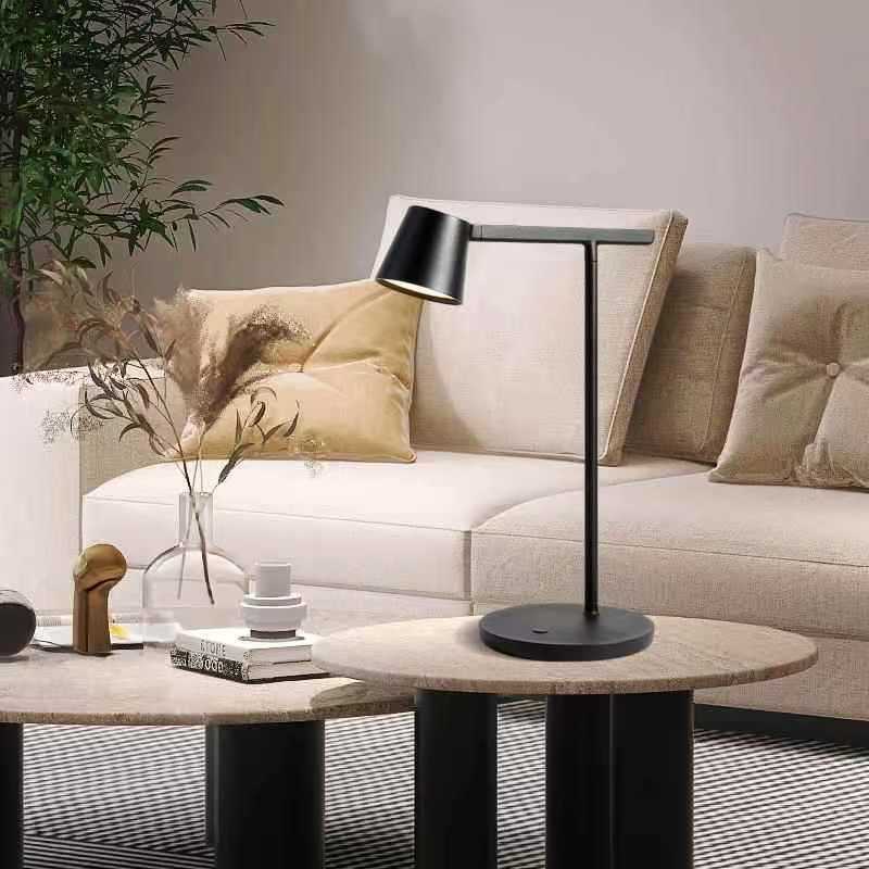 Modern living room with a beige sofa, coffee table and LED table lamp.
