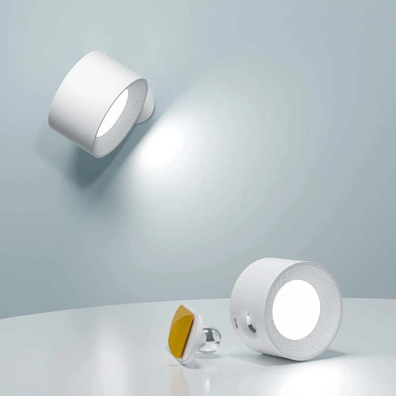 Two white wall lights on a light gray background