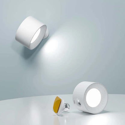 Two white wall lights on a light gray background