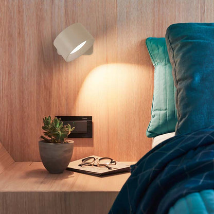 Touch LED Wall Sconce over the sofa and bedside table