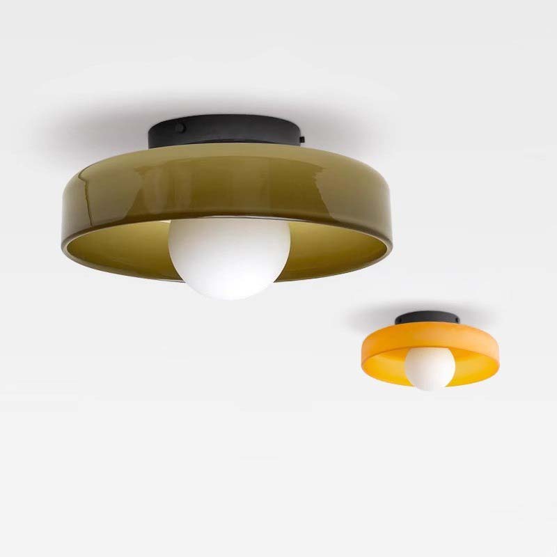 Two round ceiling lights, one green and one orange, on a white background.
