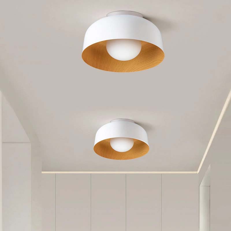 Two ceiling lights with white and wooden design on a neutral background