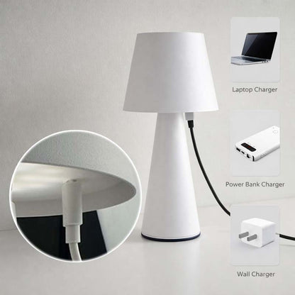 White table lamp with multiple charging options on a gray background