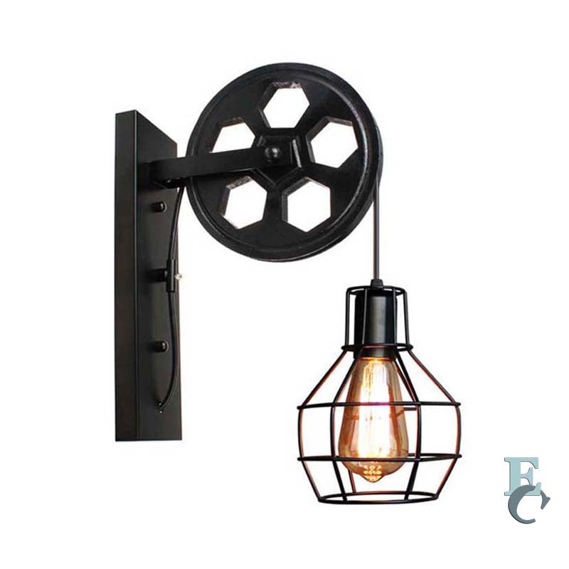 Wall-mounted industrial-style light fixture with a large wheel design on a white background.