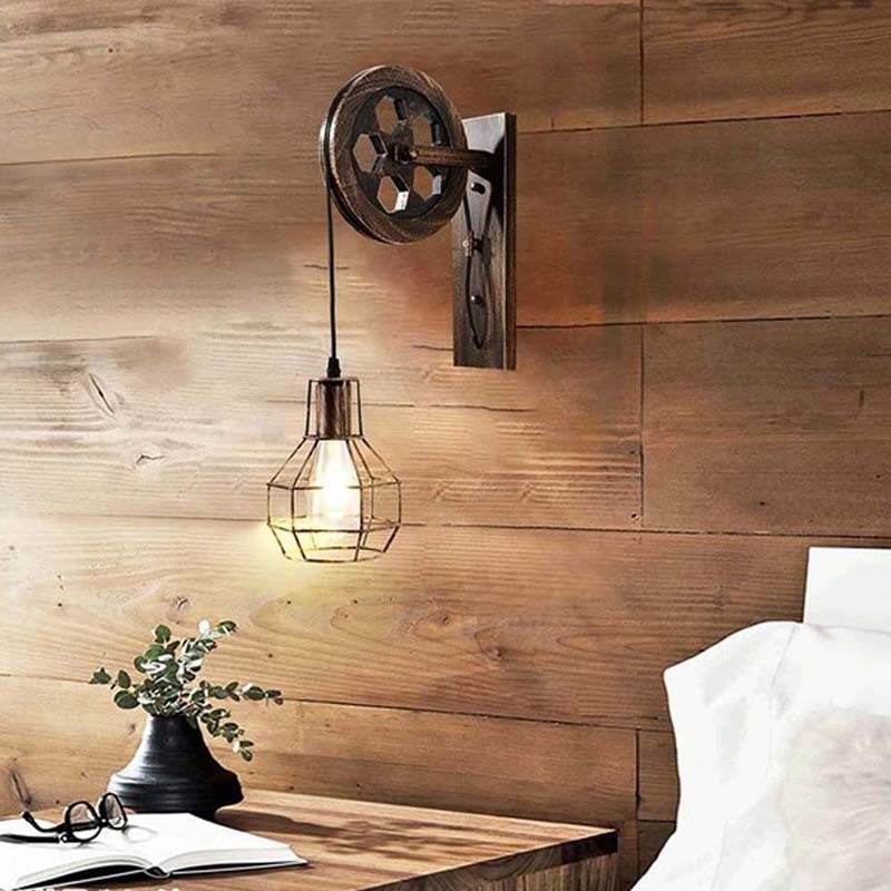 Wall-mounted industrial-style lamp with wooden panel background
