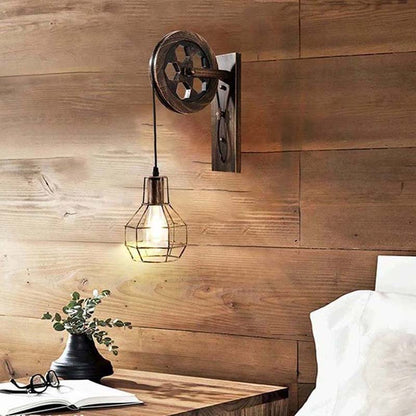 Wall-mounted industrial-style lamp with wooden panel background