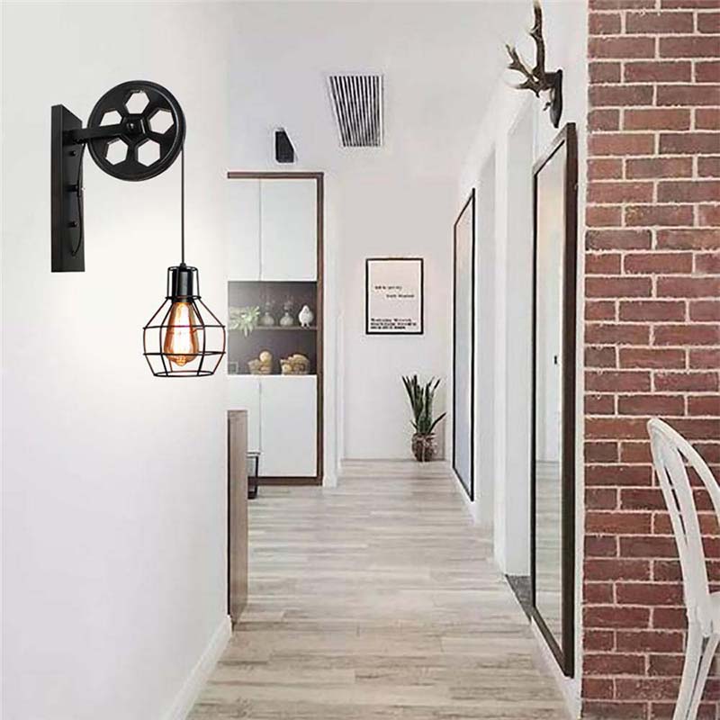 Modern interior design with wall-mounted light fixture, brick wall, and wooden floor.