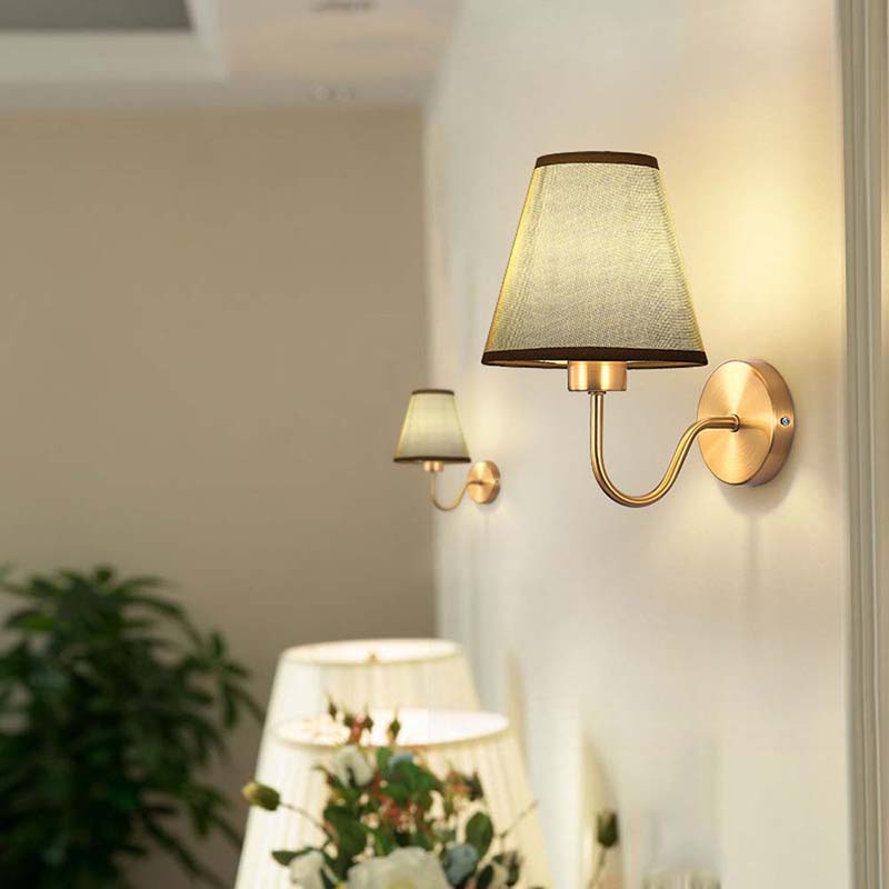 Wall-mounted lamp with a fabric shade in a home setting