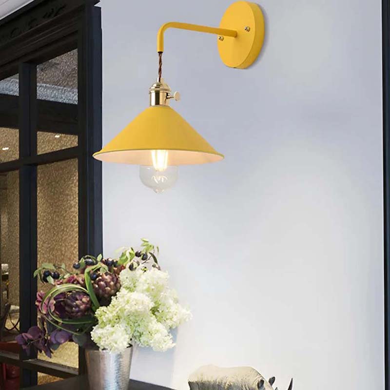 Yellow wall lamp with a white background