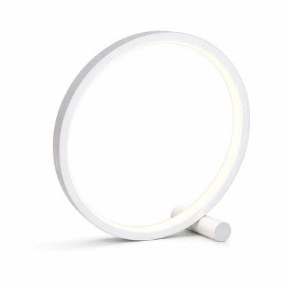 White round night light on a white background