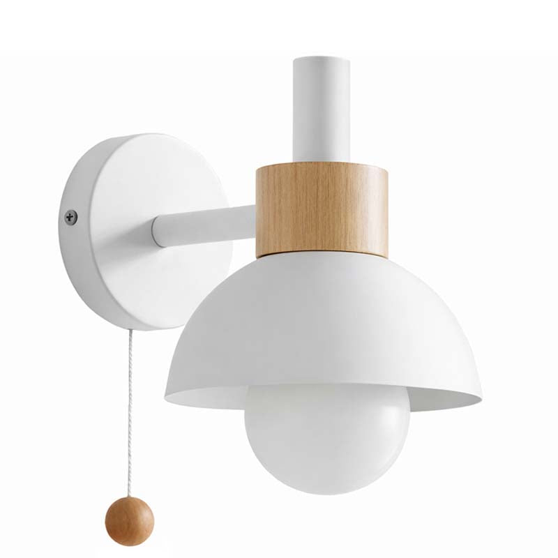 Wall-mounted lamp with white shade and wooden accents on a white background
