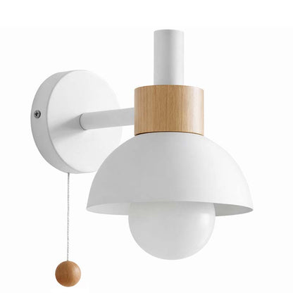 Wall-mounted lamp with white shade and wooden accents on a white background