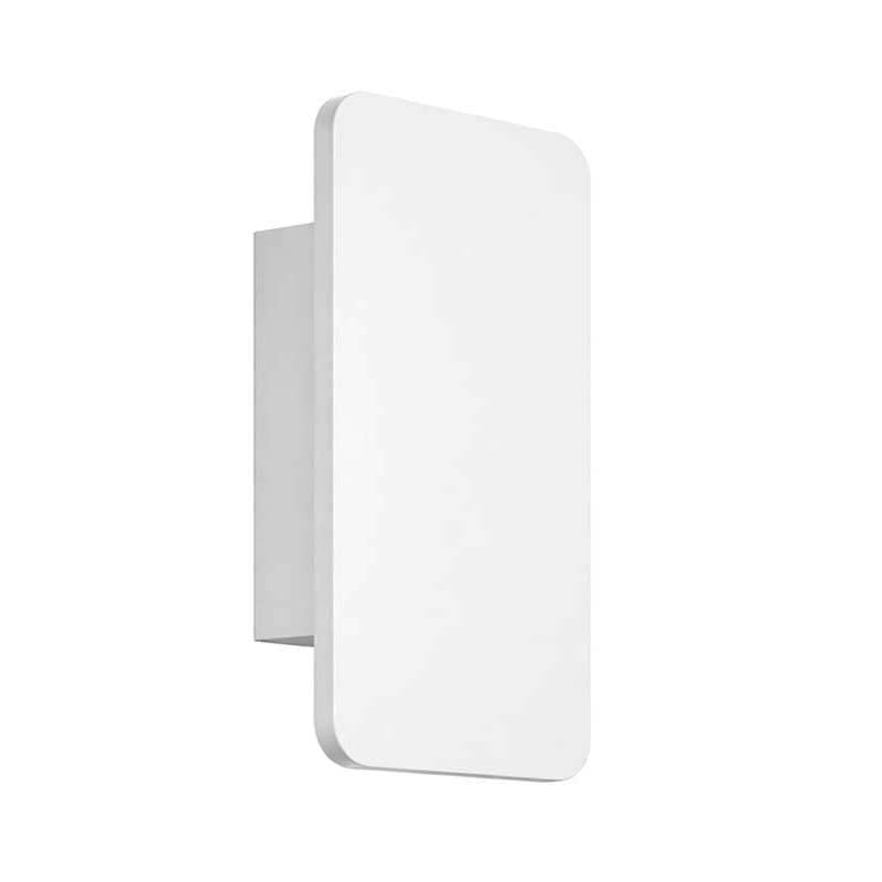 White wall-mounted light fixture on a white background