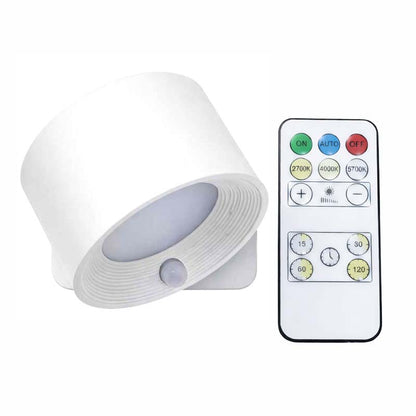 White lamp with remote control on a white background.