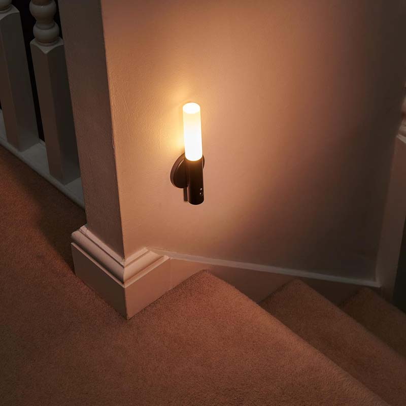 Wireless LED stair wall light with motion sensor for safe night lighting on stairs and indoor pathways