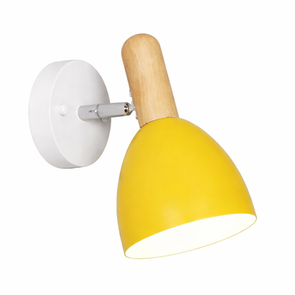 Wall-mounted lamp with yellow shade and wooden arm on a white 