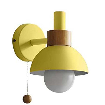 Yellow wall lamp with wooden accents on a white background
