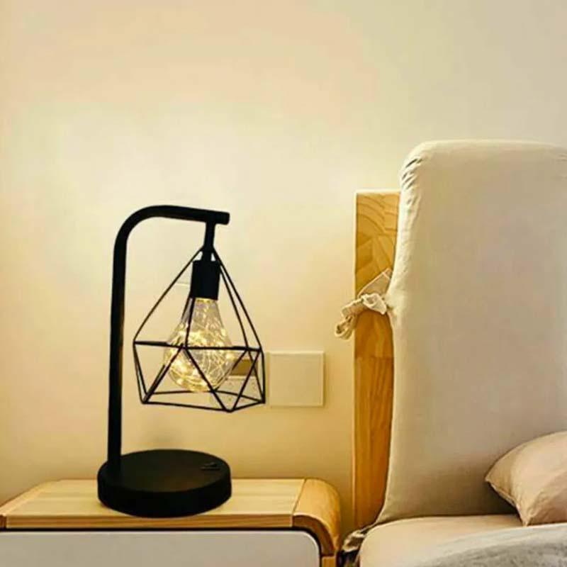 Geometric Loft LED Table Lamp on a nightstand