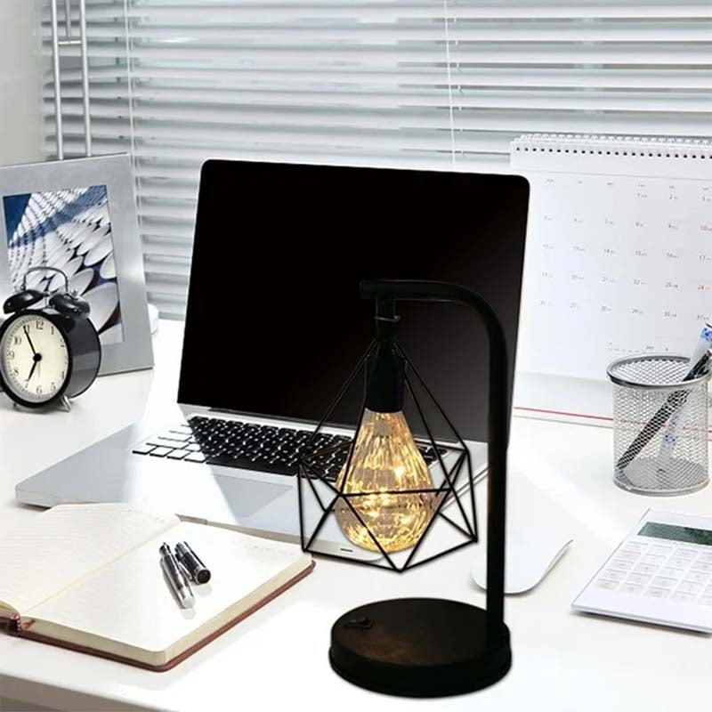 Black Geometric Loft LED Table Lamp on a home office desk