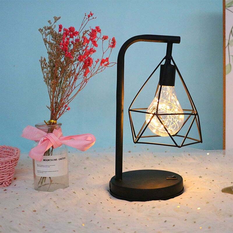 Black Geometric Loft LED Table Lamp on a soft white base in a cozy interior
