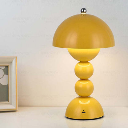 Yellow table lamp with a unique design on a light background