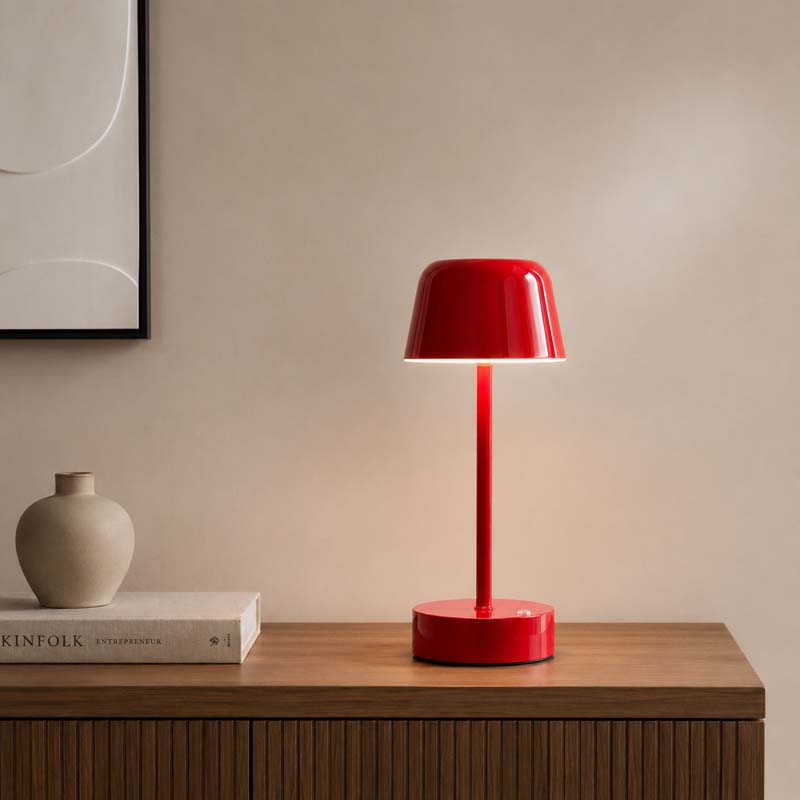 Rechargeable Cordless Touch LED Table Lamp sits on a wooden sideboard against a beige wall.