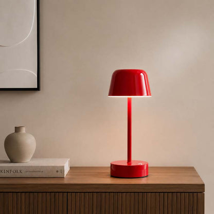 Rechargeable Cordless Touch LED Table Lamp sits on a wooden sideboard against a beige wall.