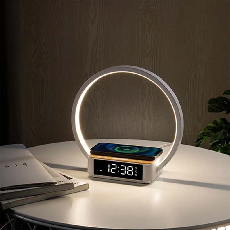 Modern lamp with digital clock on a wooden table