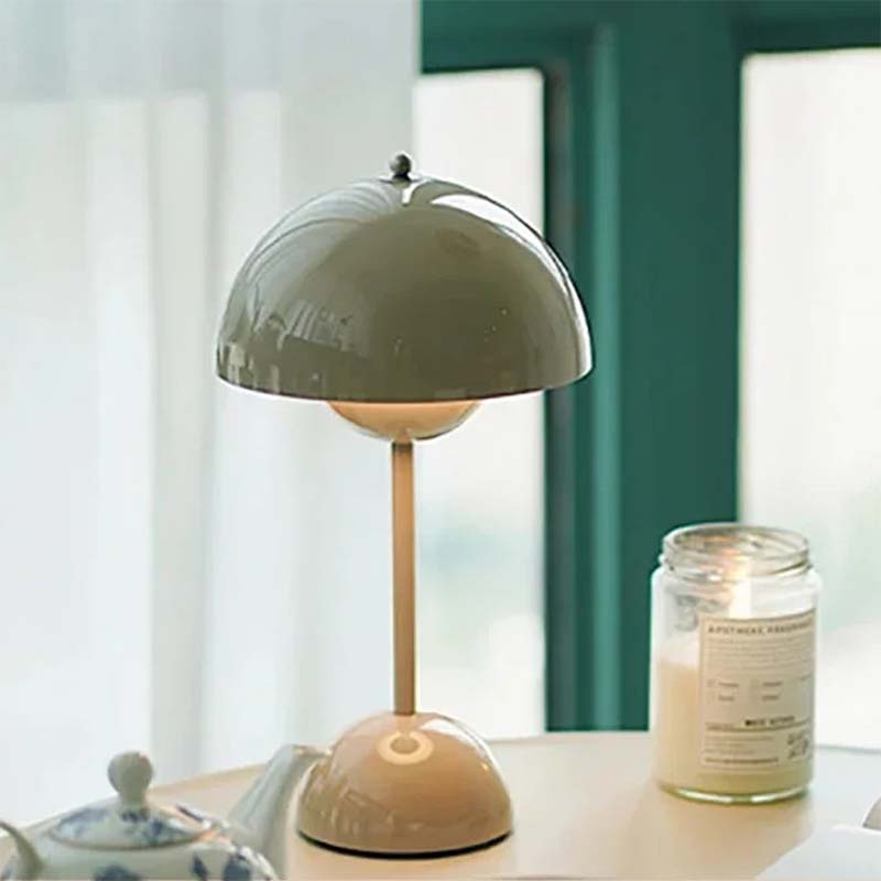 Decorative table lamp on a surface with a blurred background