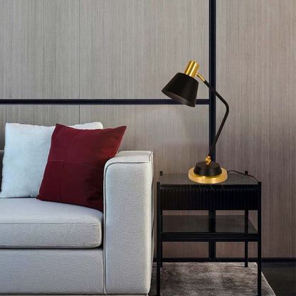 The Modern Adjustable LED Reading Desk Lamp sits on a black side table next to a light gray textured sofa.
