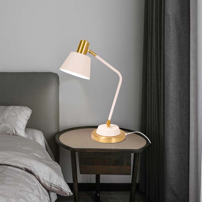 The Modern Adjustable LED Reading Desk Lamp sits on a dark wood nightstand next to the bed in the bedroom.