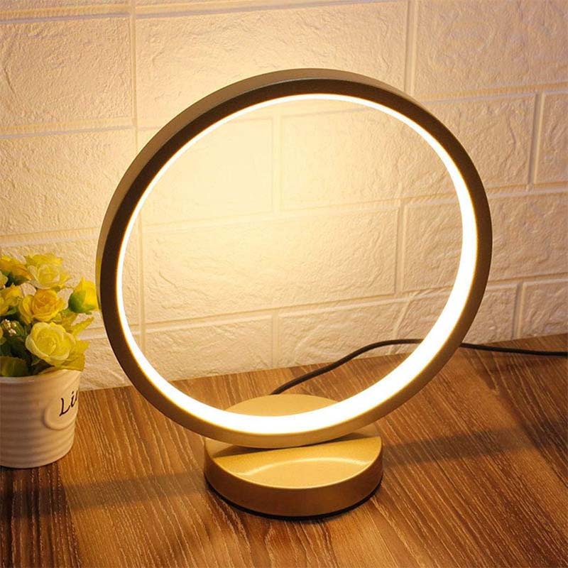 Warm LED ring table lamp 3000K, modern decorative desk light for cozy home interior and ambient lighting