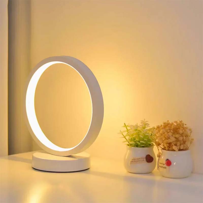 Minimalist LED ring table lamp with warm ambient light, modern bedside ring lamp for cozy bedroom decor
