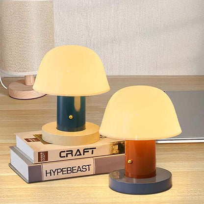 There are two Nordic Mushroom LED Table Lamps on a wooden table