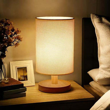 Wood Table Lamp with Natural Fabric Shade in the bedroom