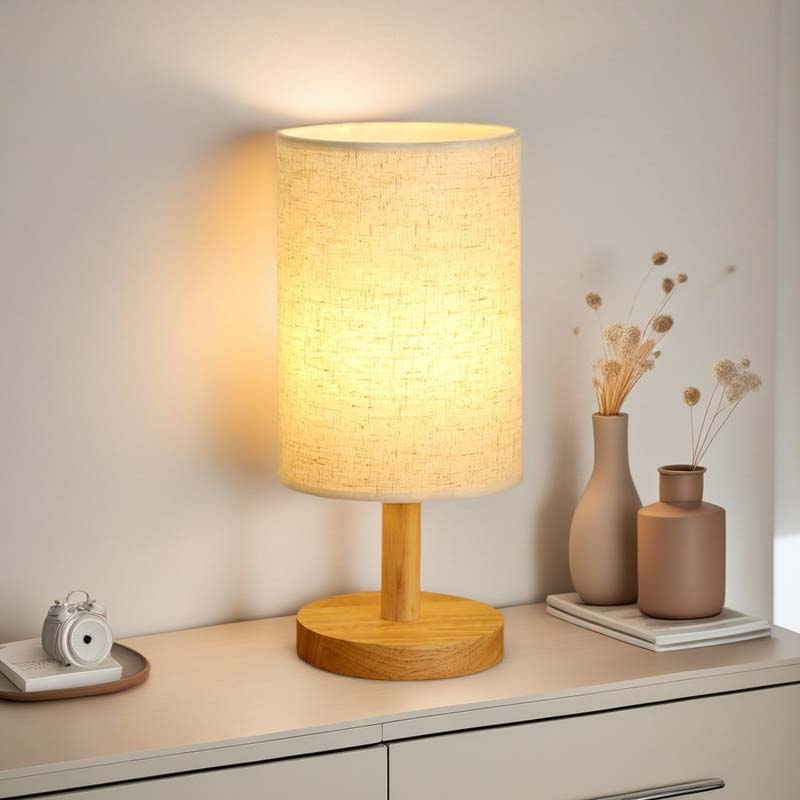 Wood Table Lamp with Natural Fabric Shade on a nightstand in the living room