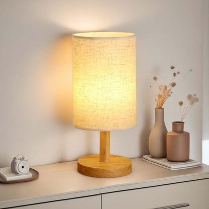 Wood Table Lamp with Natural Fabric Shade on a nightstand in the living room